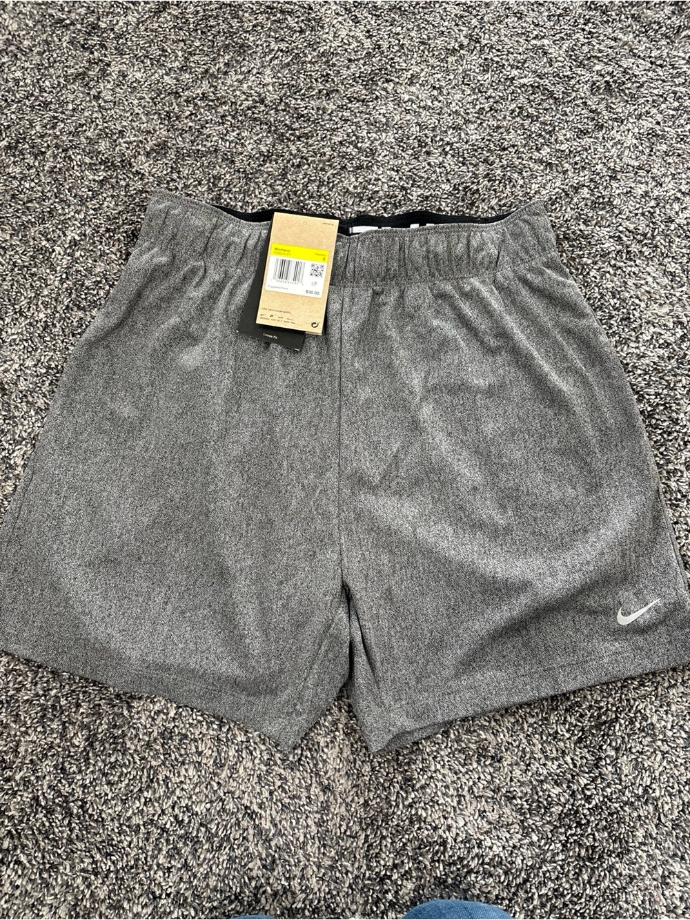Nike women’s Heather Grey Athletic Shorts with Swoosh